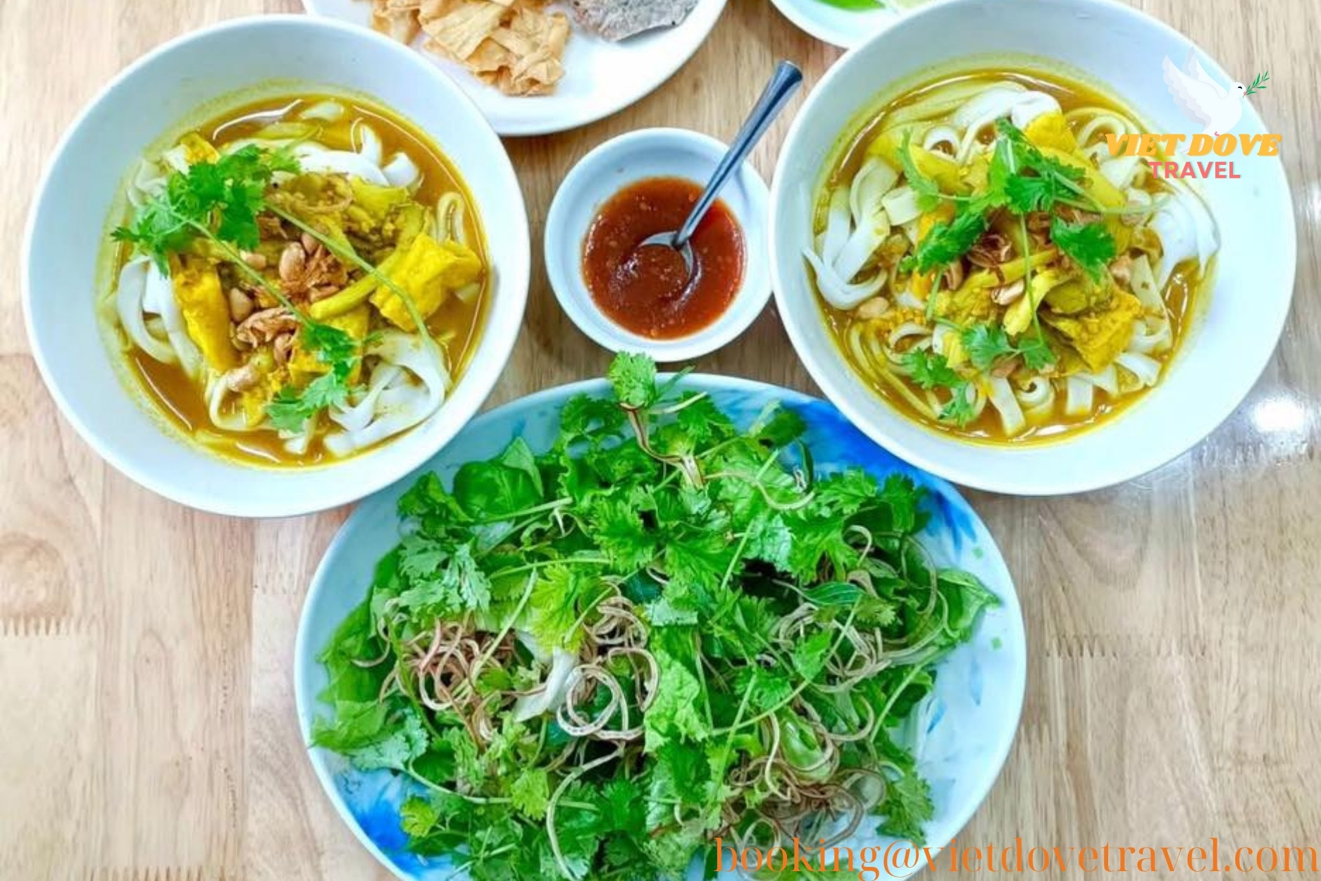 Mi Quang chay with tofu, peanuts, and fresh greens